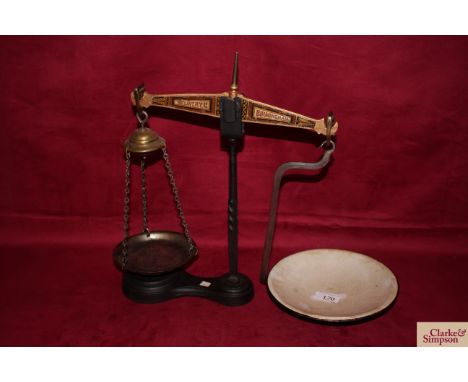 A set of W T Avery Ltd of Birmingham 8oz counter scales