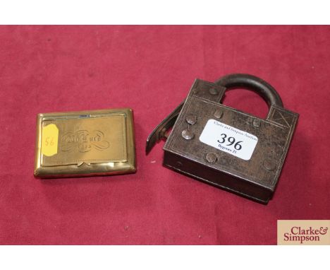 An unusual 19th Century iron padlock and a brass snuff box inscribed "W Lord 1873"