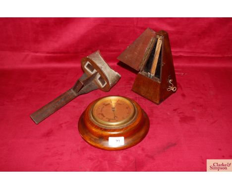 A Victorian stereoscopic viewer; an oak cased barometer and an antique metronome 