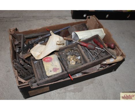 A tray box and contents of various drill bits and other tools and accessories