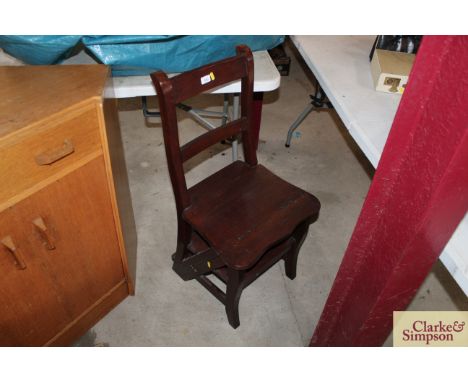 A metamorphic library step chair 