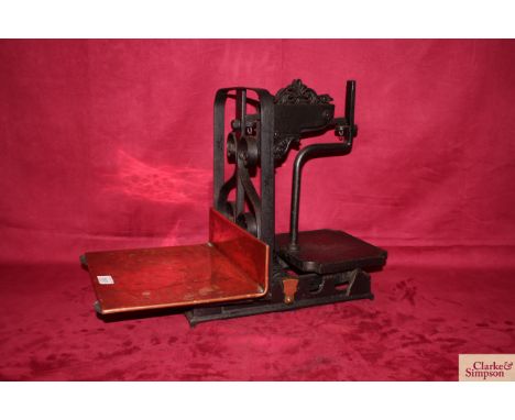A set of cast iron platform scales of small size with copper tray