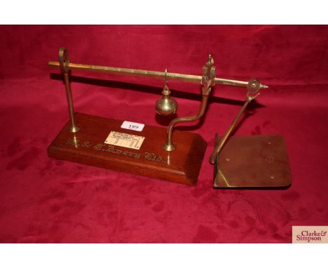 A set of W T Avery Ltd brass and mahogany inland postal scales, with faux ivory charge scale