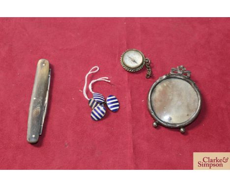A quantity of small metalware items comprising pendant compass, bone cased shuck knife, a pair of white metal enamelled cuff-