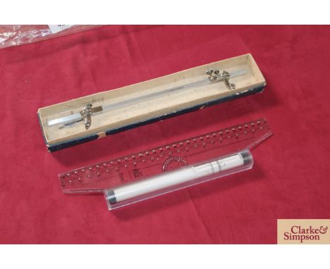 A Vemco beam compass and a rolling rule