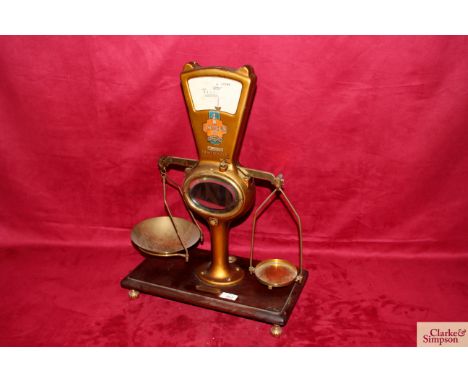 G A Wedderburn &amp; Co. Ltd Scale Makers Shirley Road, Southampton, light / heavy set of weighing scales on mahogany plinth