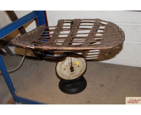 A set of Salter baby weighing scales with wicker basket