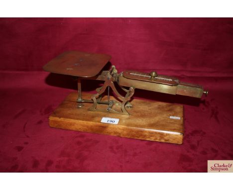 A set of late 19th Century brass counterweight postal scales by G H James of Bath (S. Turners patent)