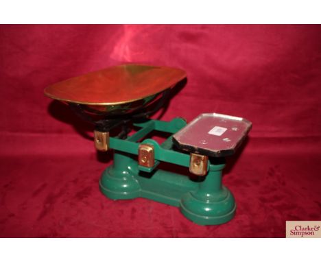 A set of cast iron shop scales with brass tray