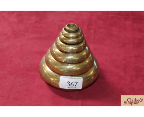 A set of seven brass scale weights, ½oz - 4lb