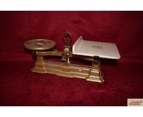 A set of cast iron W T Avery Ltd butchers scales to weigh 20lbs with ceramic platform