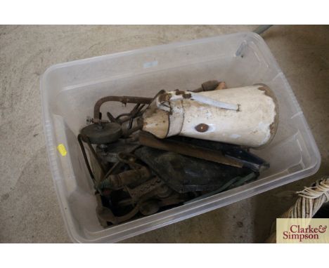 A box of miscellaneous items including enamel jug, traps, tools etc.