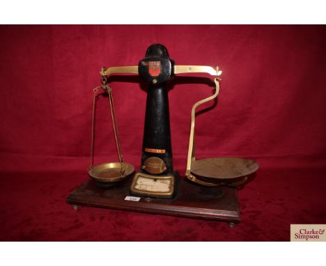 A set of Parsons of Bradford light / heavy scales with vibration regulator and brass trays 