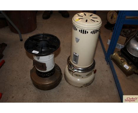 A white enamel Valor stove and one other 