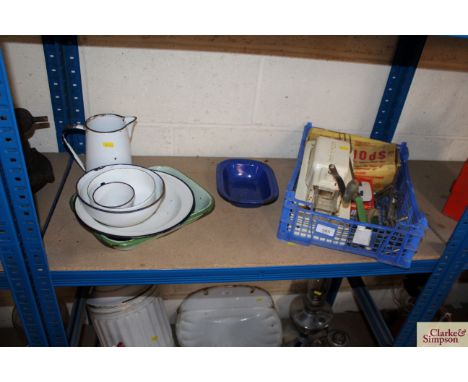 A collection of various enamel kitchenalia; a coffee grinder etc.