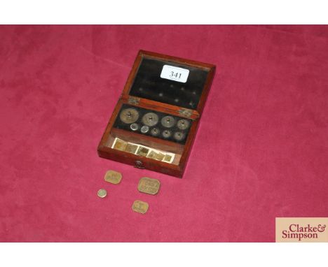 A cased set of chemist scale weights (no tweezers)