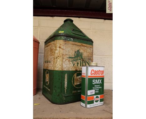 A Castrol Tractor Oil can and a small Castrol Transmission Fluid can
