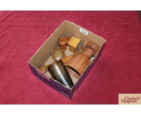 A box of assorted treen including a mauchline snuff box, a carved vine paper knife, spice shaker, goblet etc.