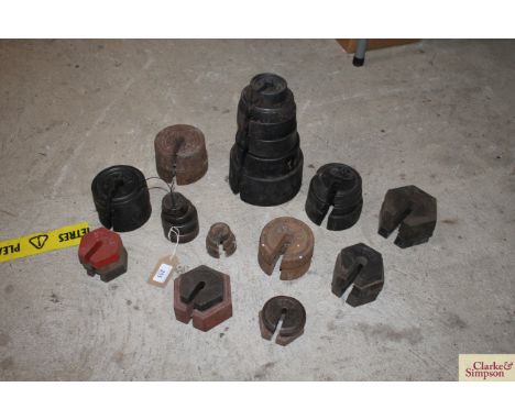 A quantity of cast iron platform scale weights etc. various sizes