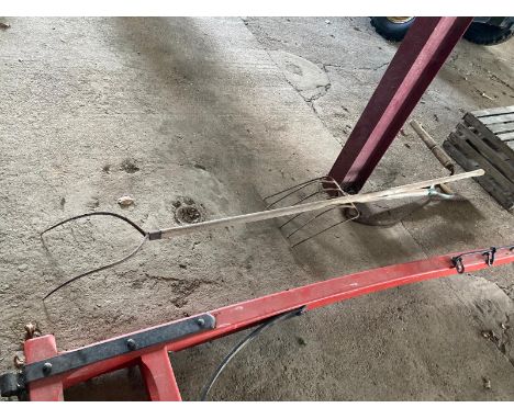Various tools to include two hay knives, large pitch fork and beet fork.