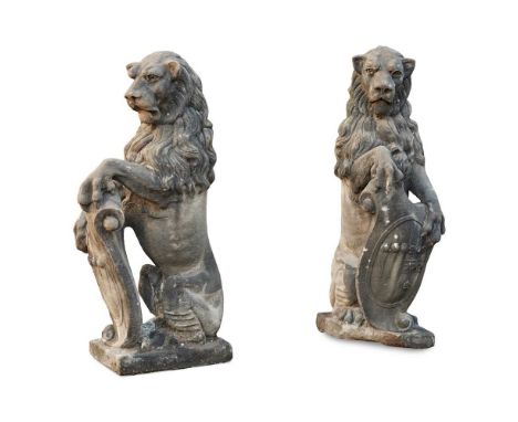 PAIR OF SCOTTISH CARVED STONE ARMORIAL LION GATE FINIALS 19TH CENTURY modelled as an opposing pair of seated lions supporting