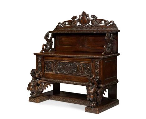 RENAISSANCE REVIVAL OAK CREDENZA  19TH CENTURY the superstructure with a single shelf surmounted by a pierced and carved cres