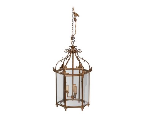 GEORGIAN STYLE BRASS HALL LANTERN 20TH CENTURY of hexagonal form with glazed panel sides and anthemion mounts, fitted for ele