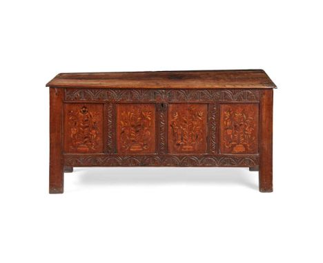 OAK MARQUETRY FOUR-PANEL CHEST  LATE 17TH CENTURY the hinged lid above a four-panel carved and floral marquetry inlaid front,
