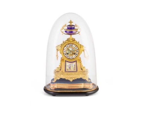 FRENCH PORCELAIN AND GILT METAL MANTEL CLOCK 19TH CENTURY the cylinder case with a porcelain Roman numeral dial with retailer