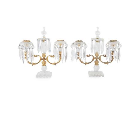 PAIR OF REGENCY CUT GLASS AND GILT METAL CANDLE LUSTRES EARLY 19TH CENTURY the central cut glass and gilt metal stem issuing 