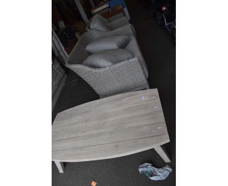 Veneered wooden low coffee table with rattan sofa and two chairs