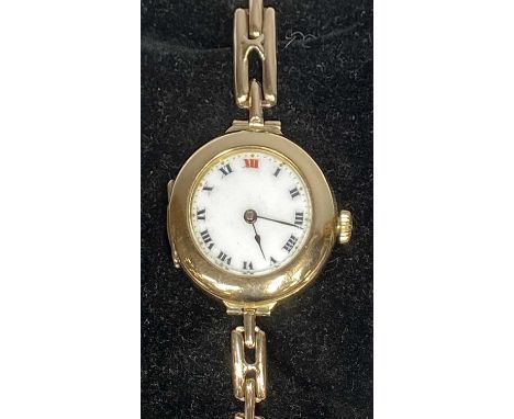 VINTAGE ROLEX 9CT GOLD CASED WRISTWATCH, white enamel dials with black Roman numerals, red at 12 o'clock, the movement signed