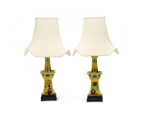 A PAIR OF SANCAI GLAZED LAMPS
On carved hardwood bases
71cm high (including shades)
Condition: Condition Report
The shades wi