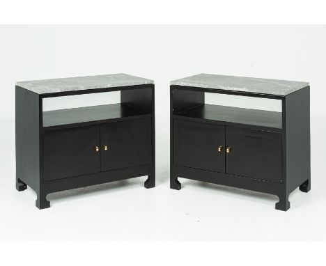 A PAIR OF BLACK LACQUERED SIDE CUPBOARDS
With a marble top and fitted with a shelf beneath and a pair of cupboard doors, with