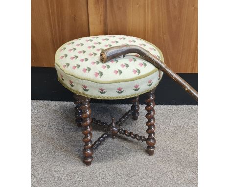 A barley twist stool and one folk art walking stick.