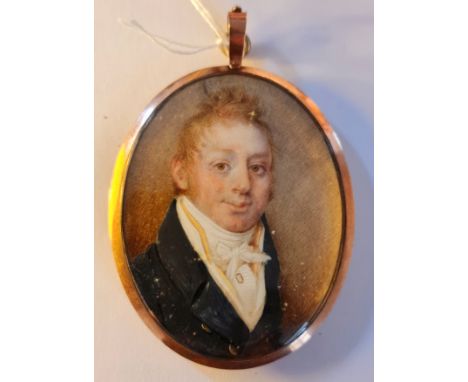 A Georgian portrait miniature on ivory of a gentleman with ginger hair in black jacket in 9ct gold oval sealed frame with hai