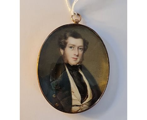 A 19th century portrait miniature on ivory of a Georgian gentleman in blue and black velvet dress coat in gilt metal sealed o