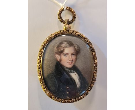 A 19th century portrait miniature on ivory gentleman in gilt metal oval frame with small hair locket to back and pin broach m