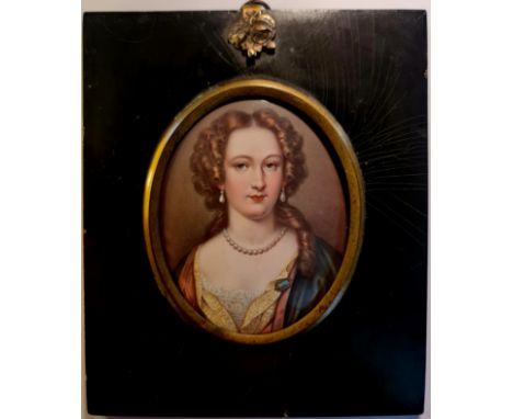 A 19th century portrait miniature enamel metal oval of Anne Marie de la Cremouille (see verso) - a lady with pearl earrings a