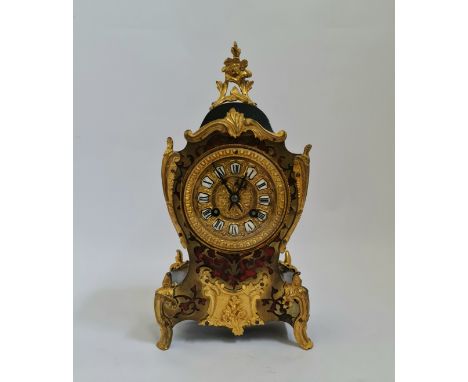 A French boulle front mantle clock with ormolu mounts height approx 30 cm.