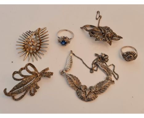 A collection of marcasite jewellery, to include brooches, necklet, ring, together with a paste blue stone cluster ring