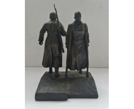 A bronze figure of Russian soldiers going and coming back signed and dated 1980 height 21 cm.
