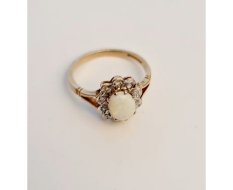 A hallmarked 9ct yellow gold opal cluster ring, ring size O, approx. weight 3gms