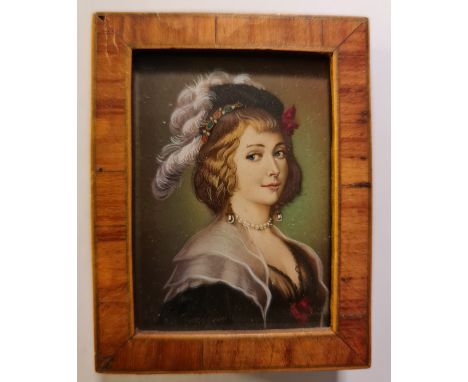 A 20th century portrait miniature of a lady with feathers in her hat and pearl necklace in an inlaid frame.