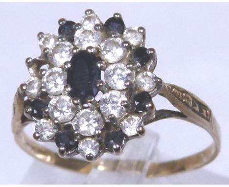 GOLD STONE SET RING. 9 ct yellow gold CZ and black stone set ring, Size R, missing one stone 