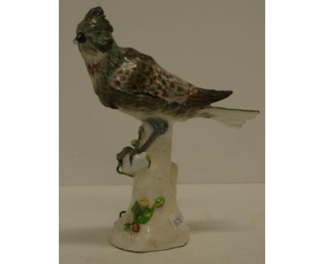 Antique Meissen porcelain bird figure bird on branch figure. Crossed swords mark to base. (As inspected: beak broken, but pie