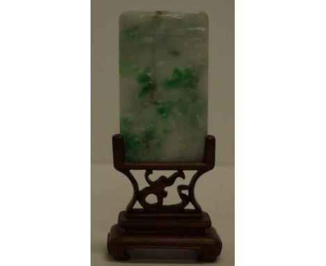 Chinese carved jade miniature screen jade carved to both sides with figures in a garden. On carved fitted wood stand. H13cms 