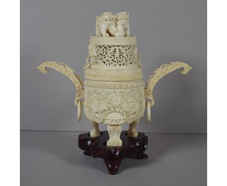 Antique oriental ivory lidded pot, C:1900 with ornately carved base and figural top, 17.5cm wide, 15cm high approx, a carved 