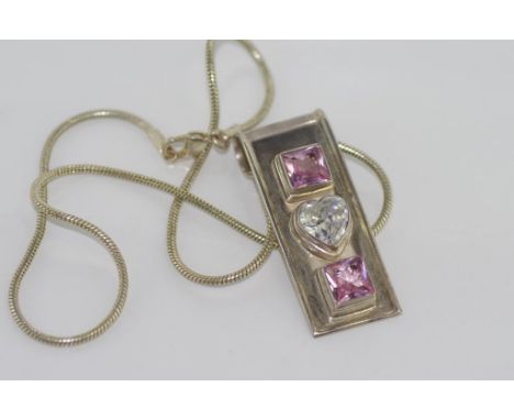 Silver pendant on a silver chain Pendant set with pink and white stones