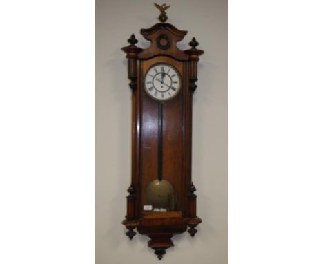 Early Vienna wood cased regulator clock Roman numerals on enamel dial (small hairline cracks). Pendulum and weight available.